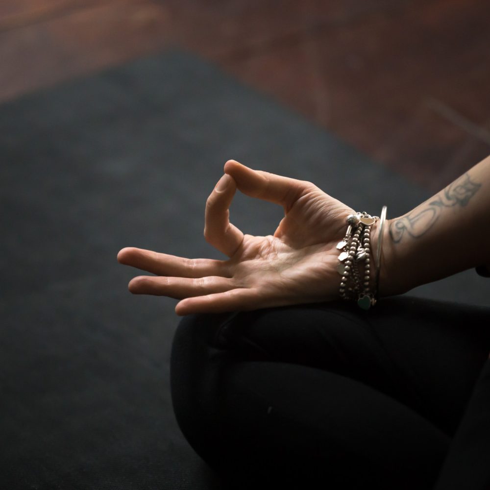 closeup-mudra-gesture-performed-with-young-female-fingers